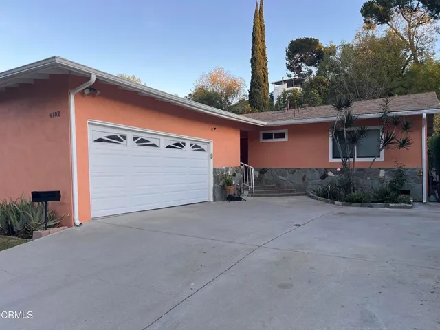 a view of backyard of house