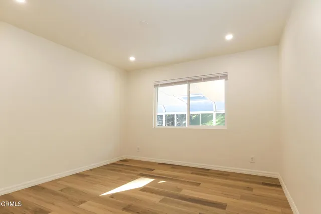 a view of a room with windows