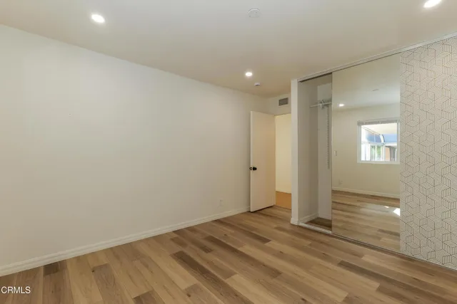 a view of a patio with a yard