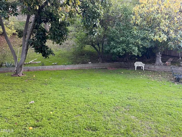 a view of a backyard with a garden