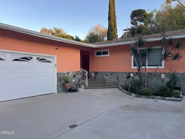 a view of a house with a patio
