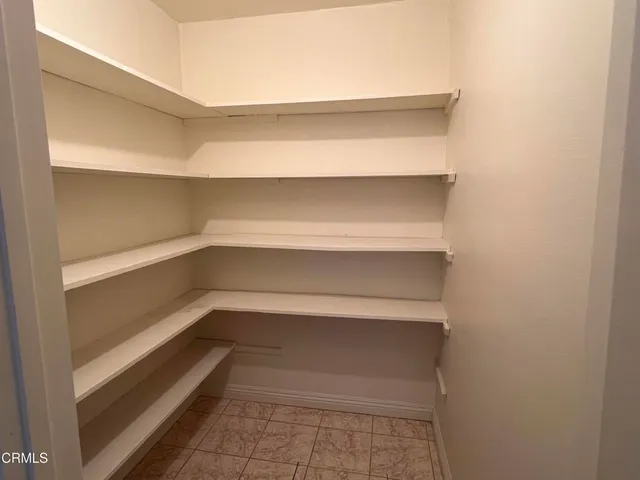 a storage room with washer and dryer