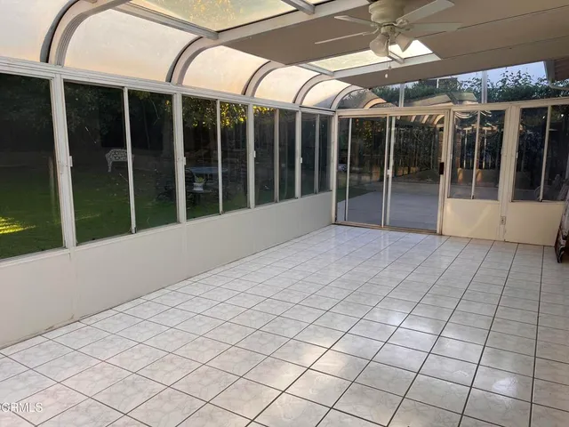 a view of a room with windows