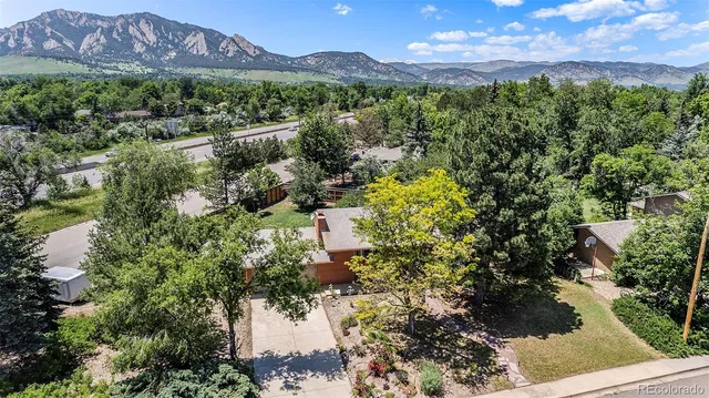 a view of a city with a mountain in the background