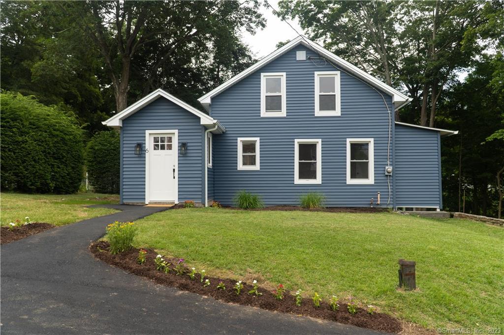 6 Plains Road East Haddam, CT 06469 - Photo 1 of 1 a front view of a house with yard