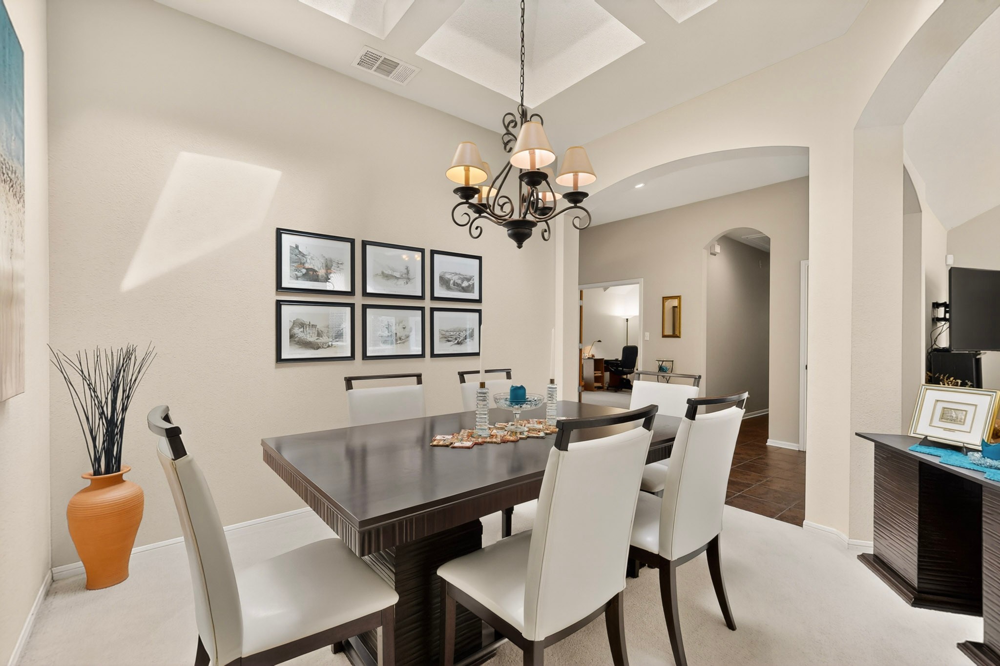 905 Victoria Ridge Drive Pflugerville, TX 78660 - Photo 8 of 32 Elegant skylight and tray ceiling crown this formal dining area.