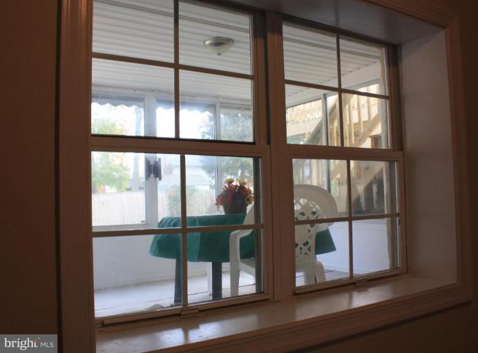 13103 Miles Road Middle River, MD 21220 - Photo 24 of 29 Viwe of Sunroom from Rec Room