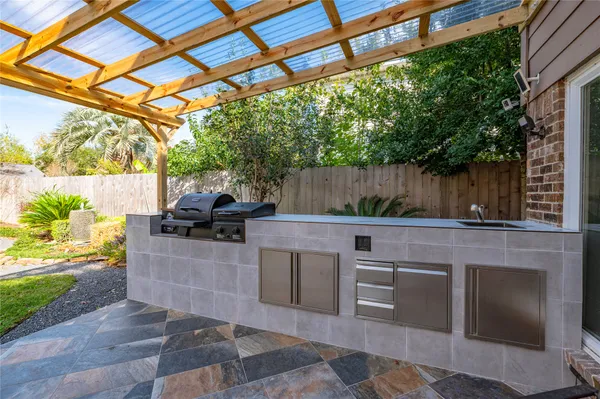 a view of backyard with seating space