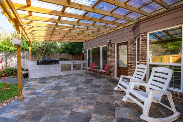a view of a building with a patio