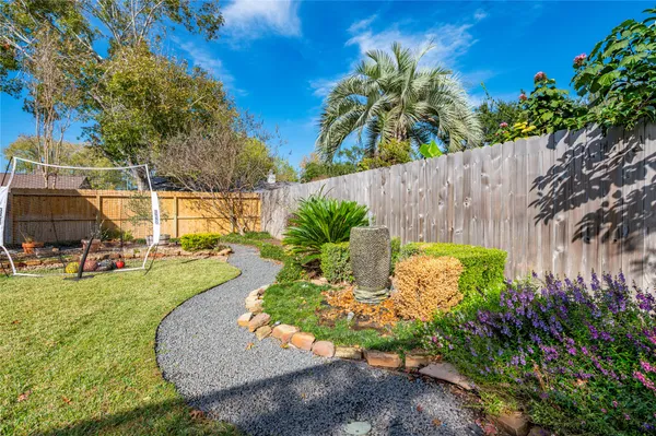 a view of a garden with a slide