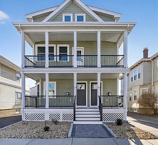 a front view of a house with a porch