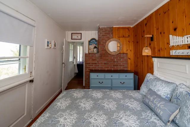 a view of room with furniture and a window