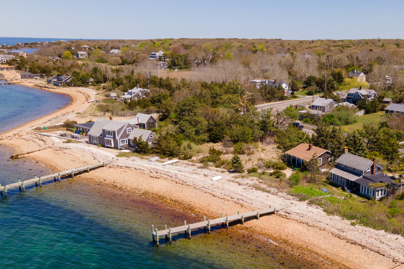 11 Beach Road Oak Bluffs, MA 02557 - Photo 2 of 18 an aerial view of residential houses with outdoor space