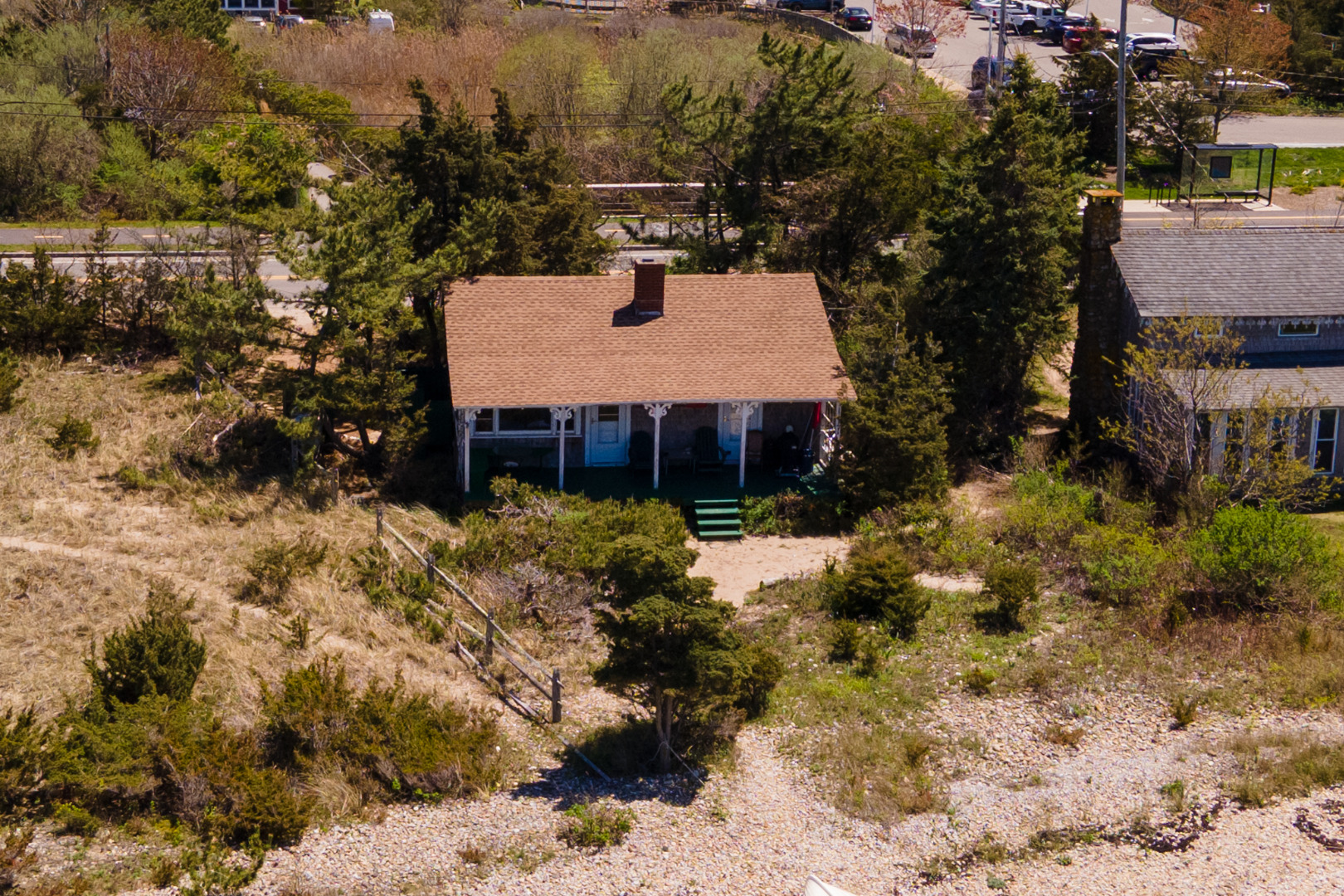 11 Beach Road Oak Bluffs, MA 02557 - Photo 3 of 18 a front view of a house with a yard