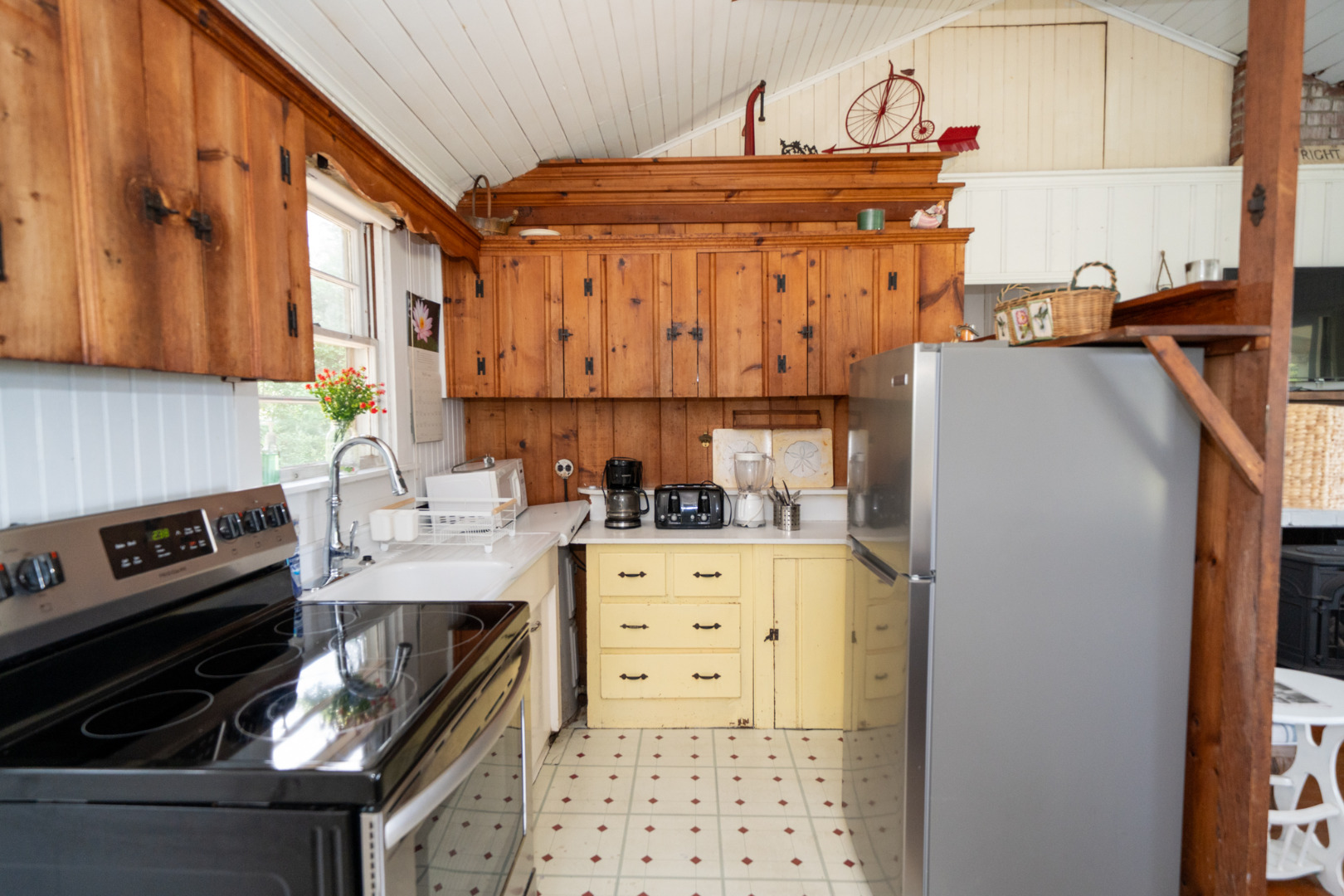 11 Beach Road Oak Bluffs, MA 02557 - Photo 5 of 18 a kitchen with appliances and cabinets