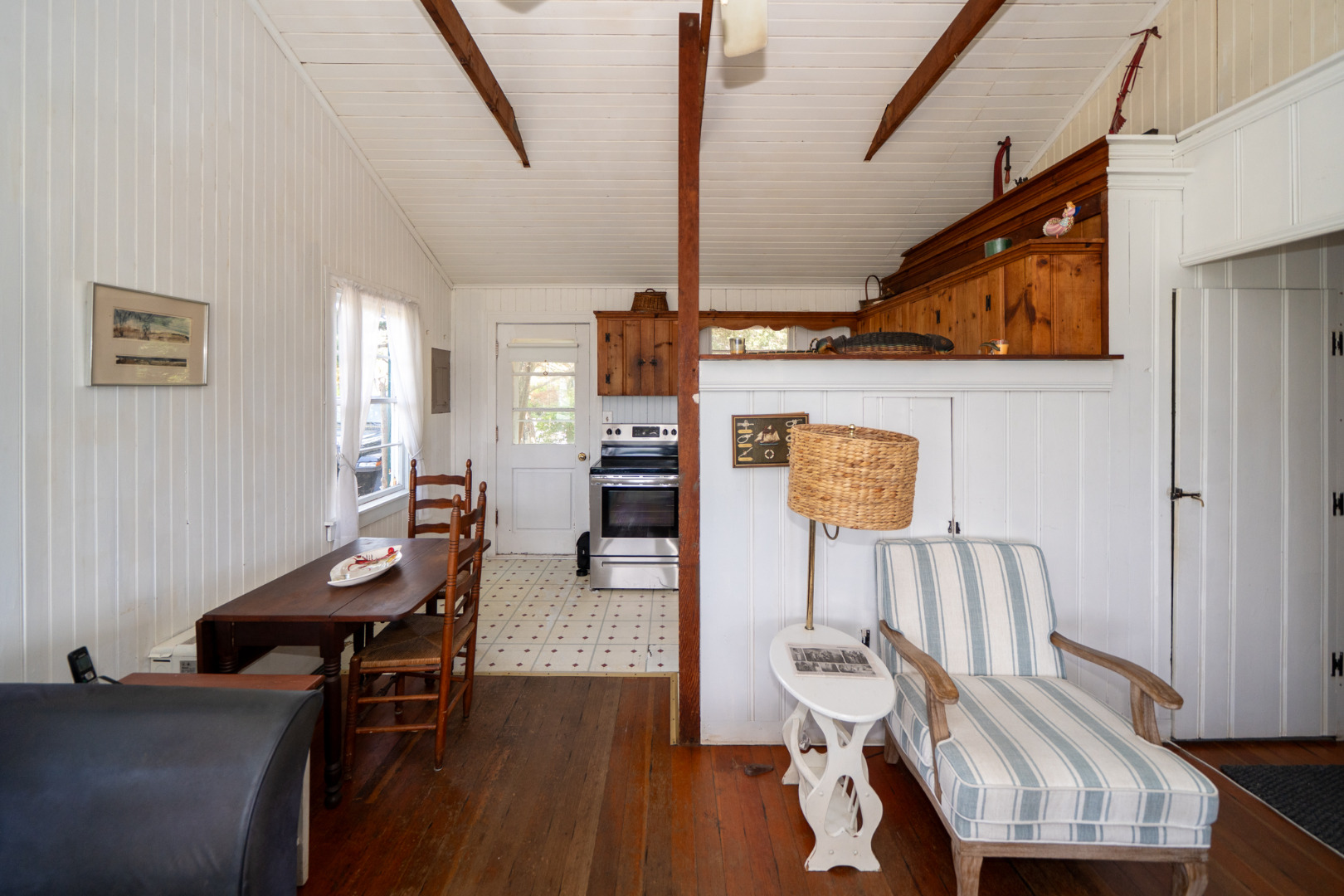 11 Beach Road Oak Bluffs, MA 02557 - Photo 6 of 18 a living room with furniture and wooden floor