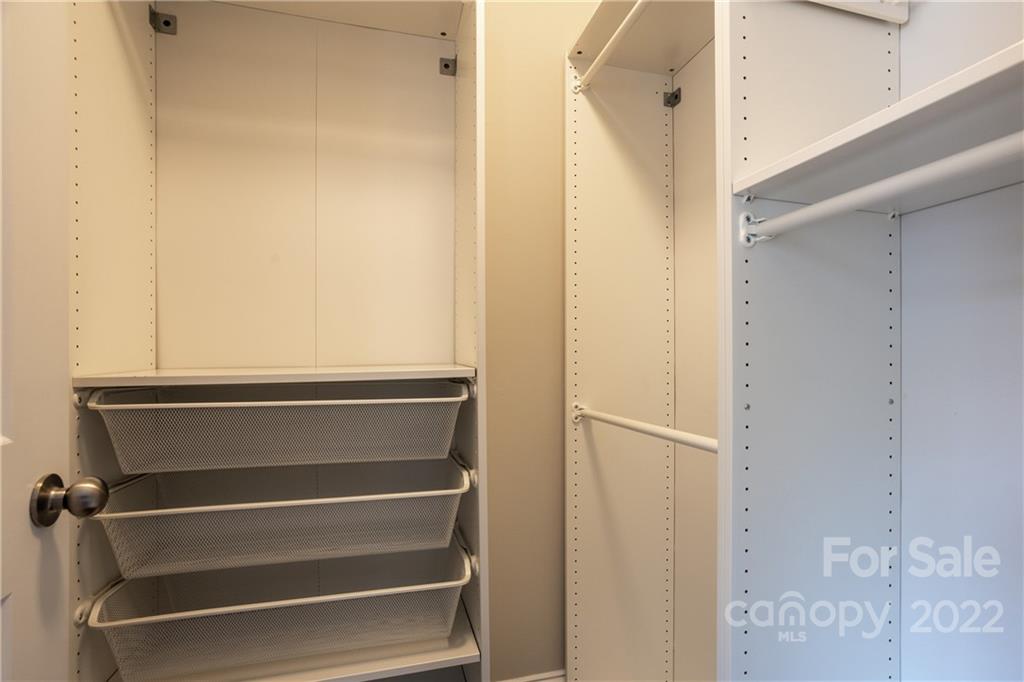 907 Ospre Lane Fort Mill, SC 29708 - Photo 25 of 39 a view of walk in closet with empty racks