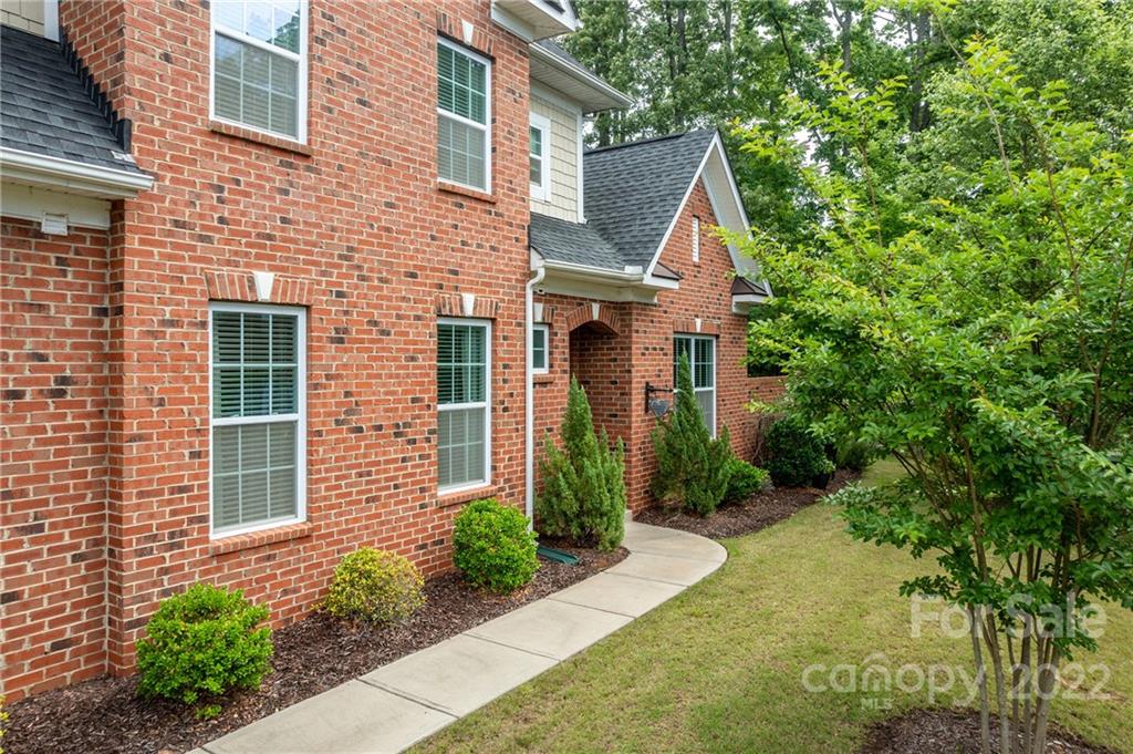 907 Ospre Lane Fort Mill, SC 29708 - Photo 3 of 39 a front view of a house with garden