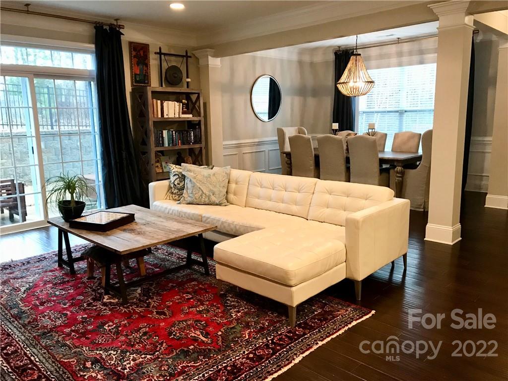 907 Ospre Lane Fort Mill, SC 29708 - Photo 6 of 39 a living room with furniture a rug and a large window