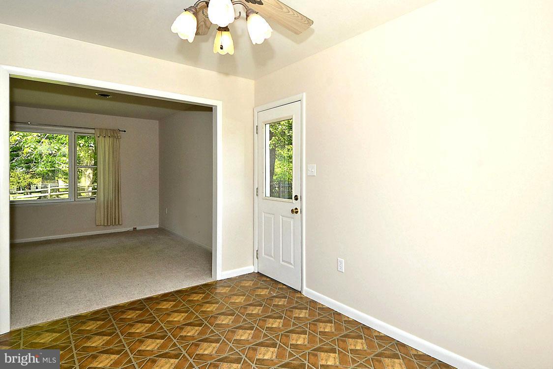 5507 Brooks Woods Road Lothian, MD 20711 - Photo 11 of 30 Easy Flow into Dining Area and Kitchen