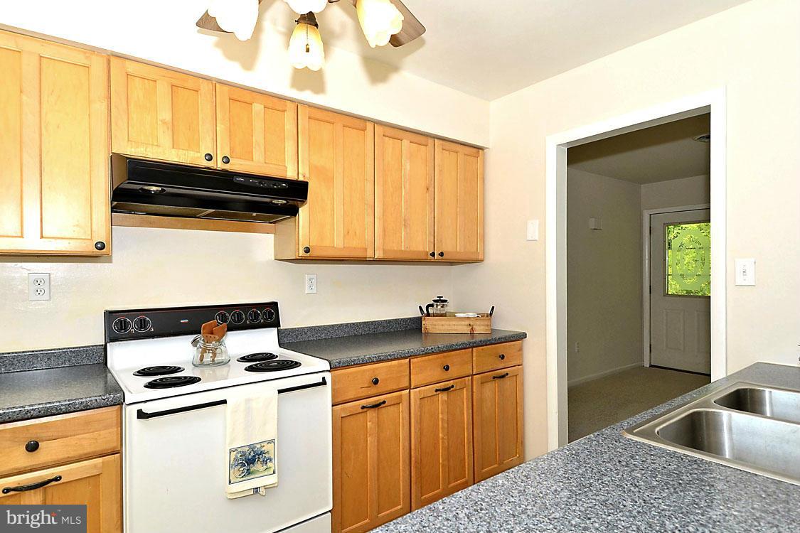 5507 Brooks Woods Road Lothian, MD 20711 - Photo 13 of 30 Remodeled Galley-Style Kitchen