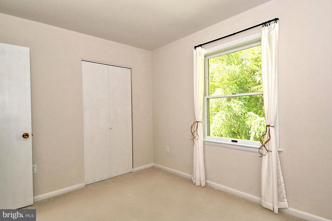 5507 Brooks Woods Road Lothian, MD 20711 - Photo 25 of 30 Bright Breezy Third Bedroom