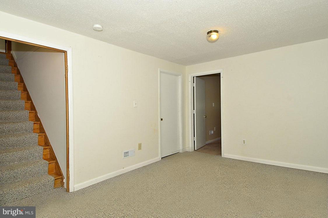 5507 Brooks Woods Road Lothian, MD 20711 - Photo 6 of 30 Partially Finished Lower Level