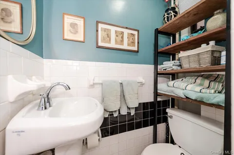 a bathroom with a sink a bath tub and a shower
