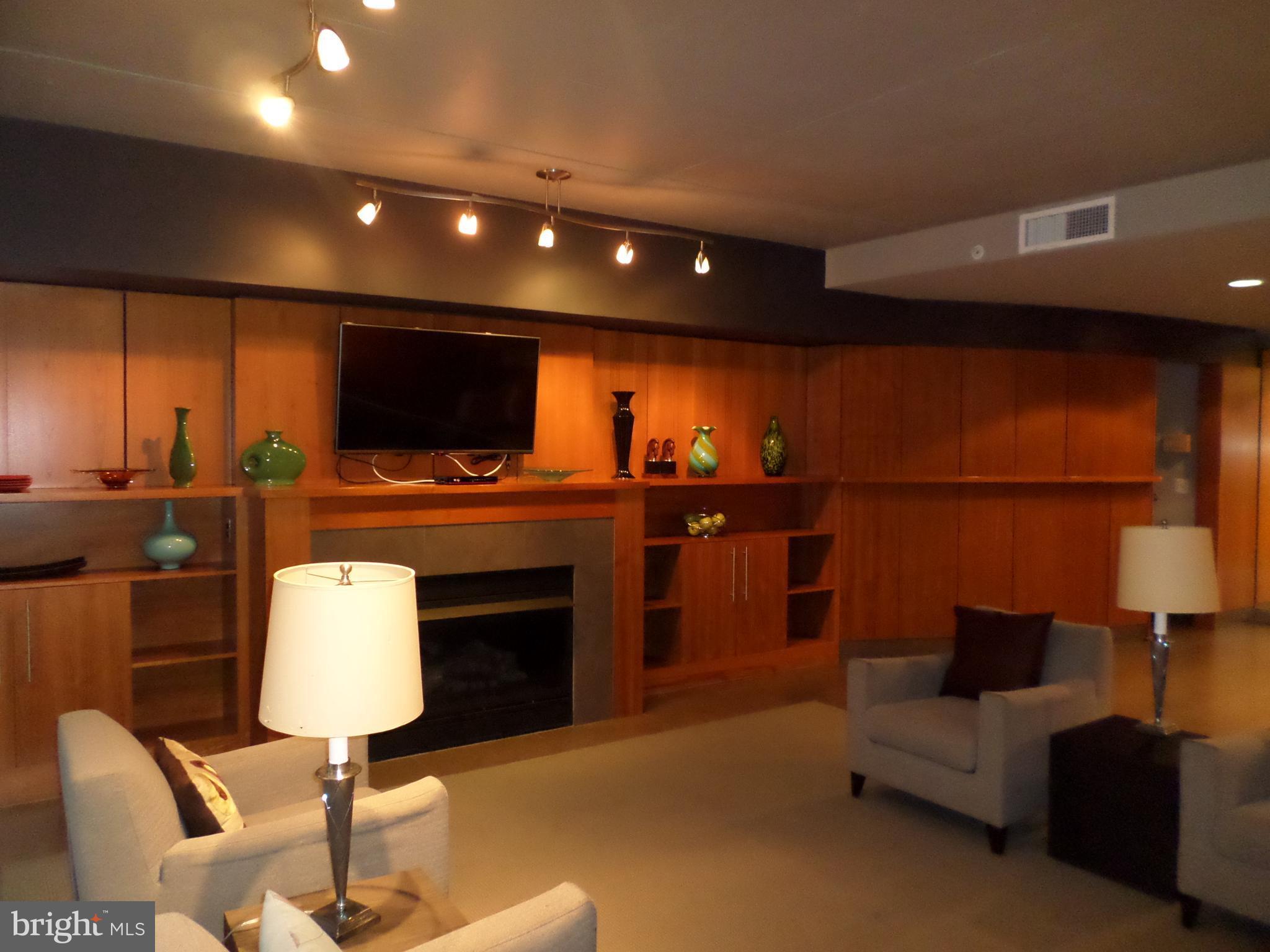 1133 14th Street Northwest, Unit 903 Washington, DC 20005 - Photo 13 of 18 Alta family room with TV area