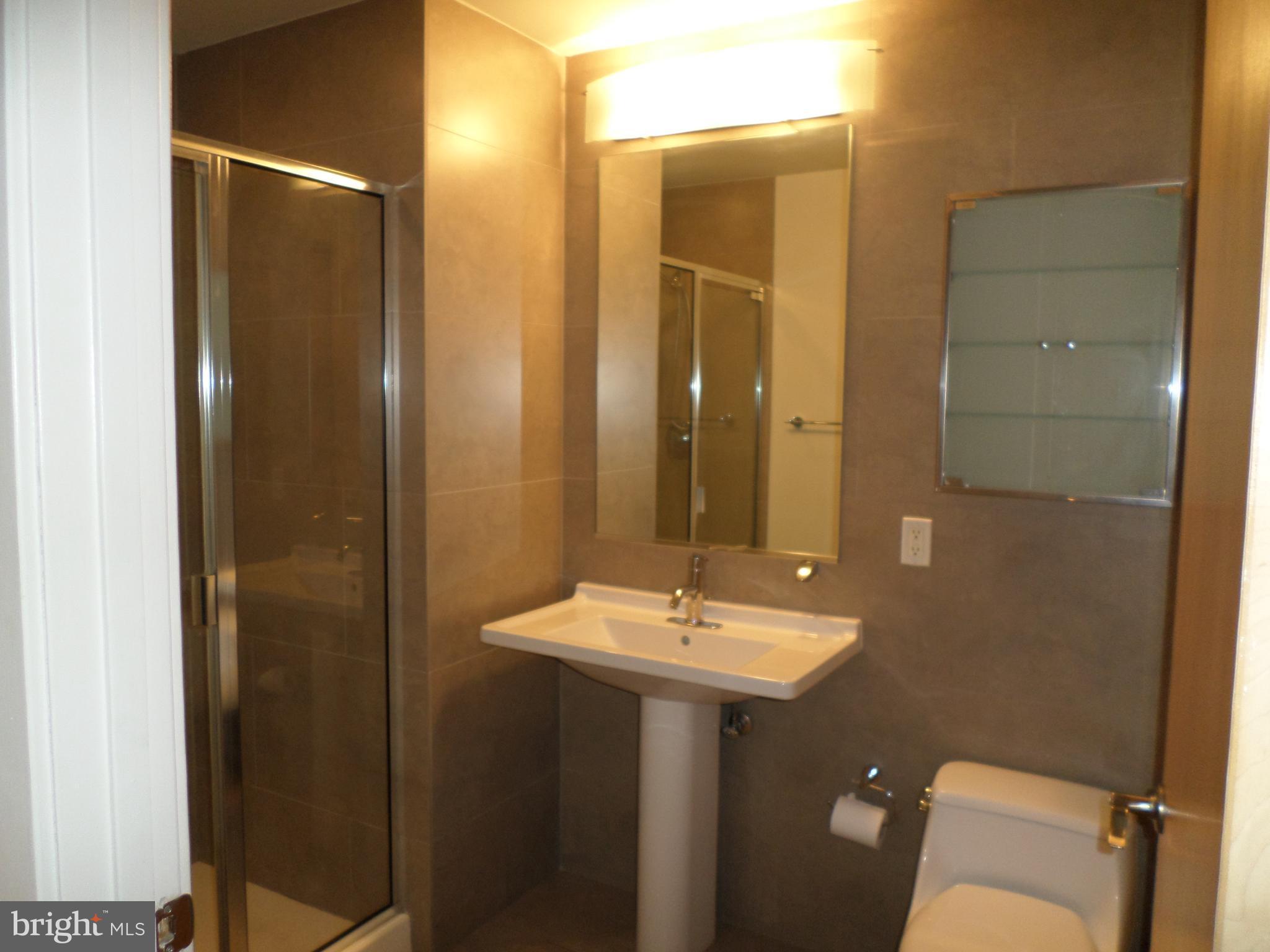 1133 14th Street Northwest, Unit 903 Washington, DC 20005 - Photo 7 of 18 Bathroom with shower
