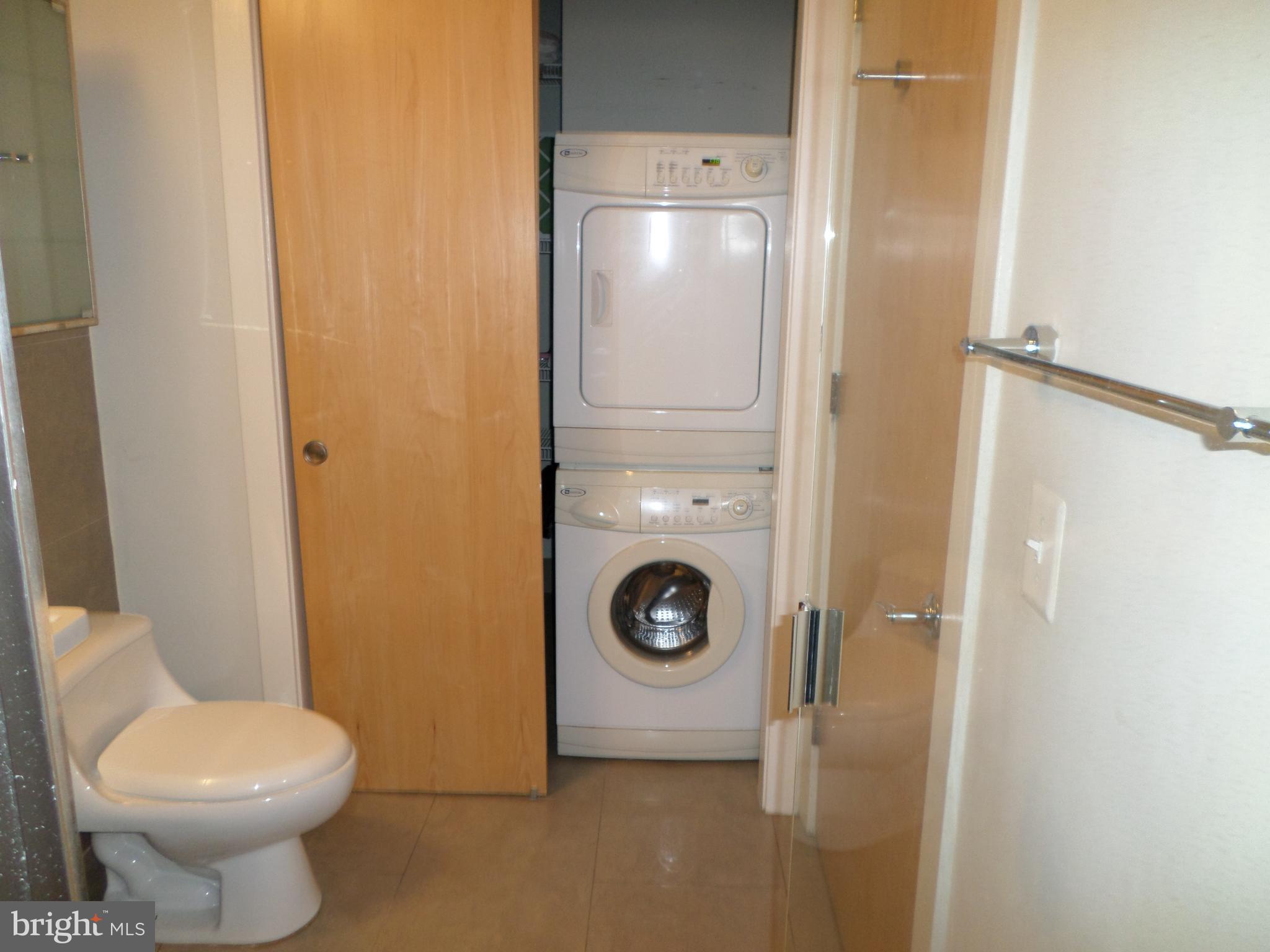 1133 14th Street Northwest, Unit 903 Washington, DC 20005 - Photo 8 of 18 Washer & Dryer in Bathroom