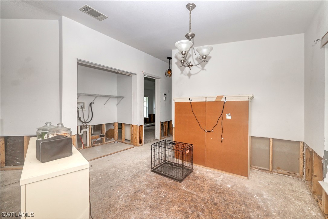 149 Raintree Lane Fort Myers, FL 33908 - Photo 19 of 22 a view of a livingroom with furniture and a ceiling fan