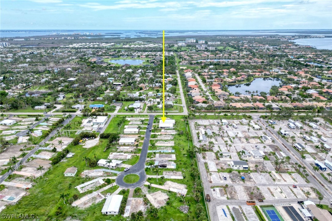 149 Raintree Lane Fort Myers, FL 33908 - Photo 7 of 22 an aerial view of residential houses with outdoor space