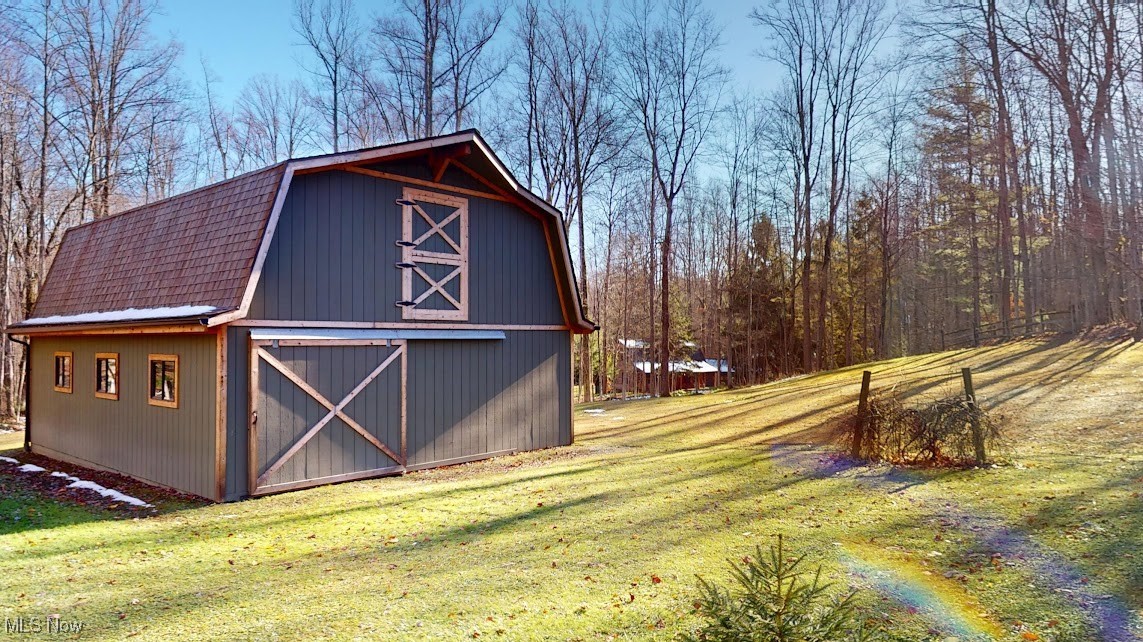 9471 Sherman Road Chesterland, OH 44026 - Photo 33 of 40 View of barn featuring with sliding door