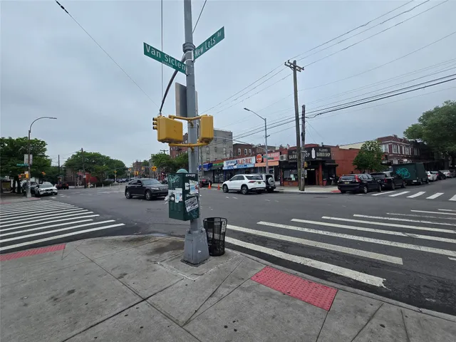 a view of a cars parked in back of a building