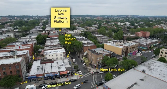 an aerial view of a city with lots of residential buildings