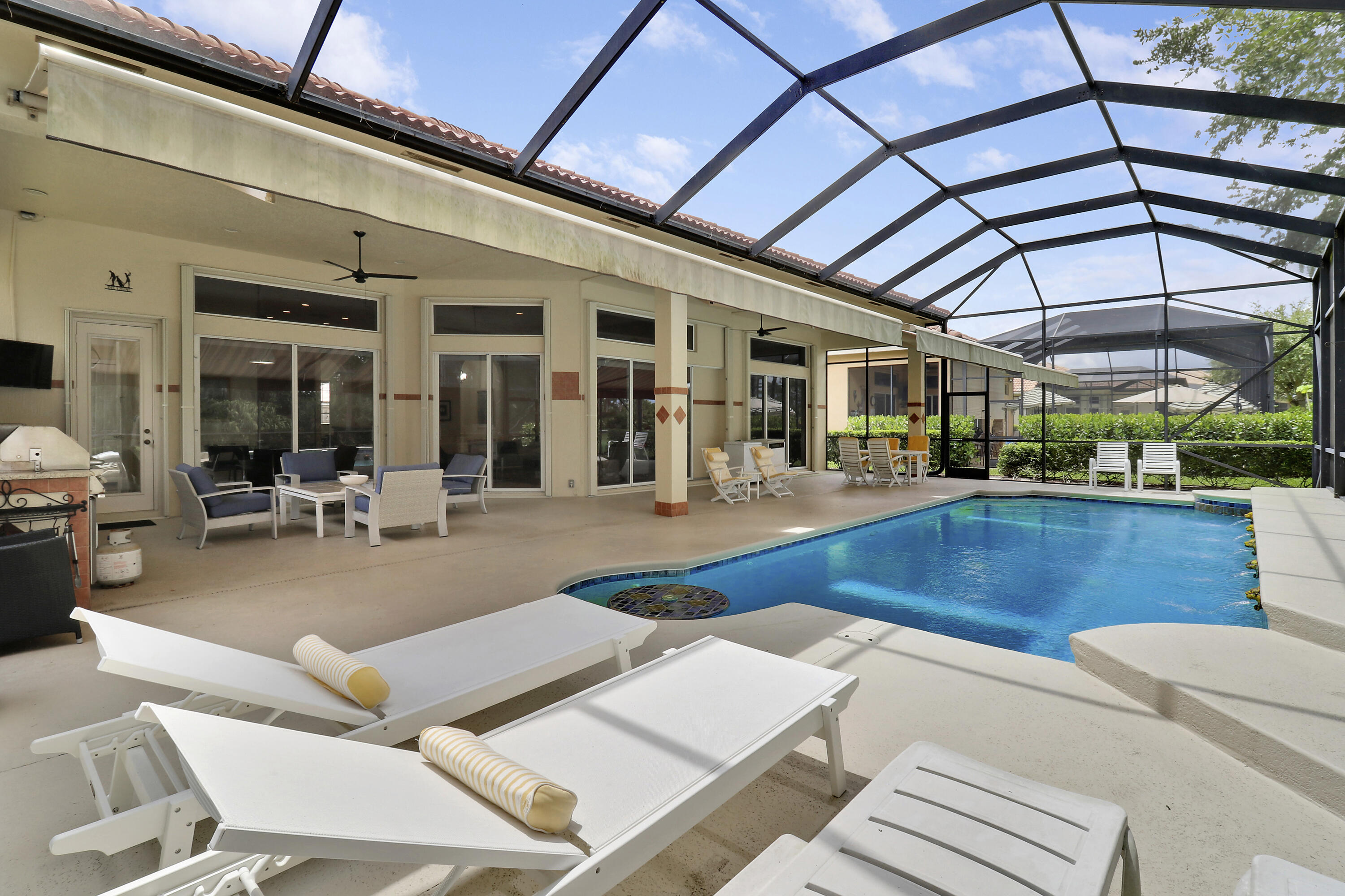 8613 Tompson Point Road Port St. Lucie, FL 34986 - Photo 44 of 78 Screened Pool and Deck