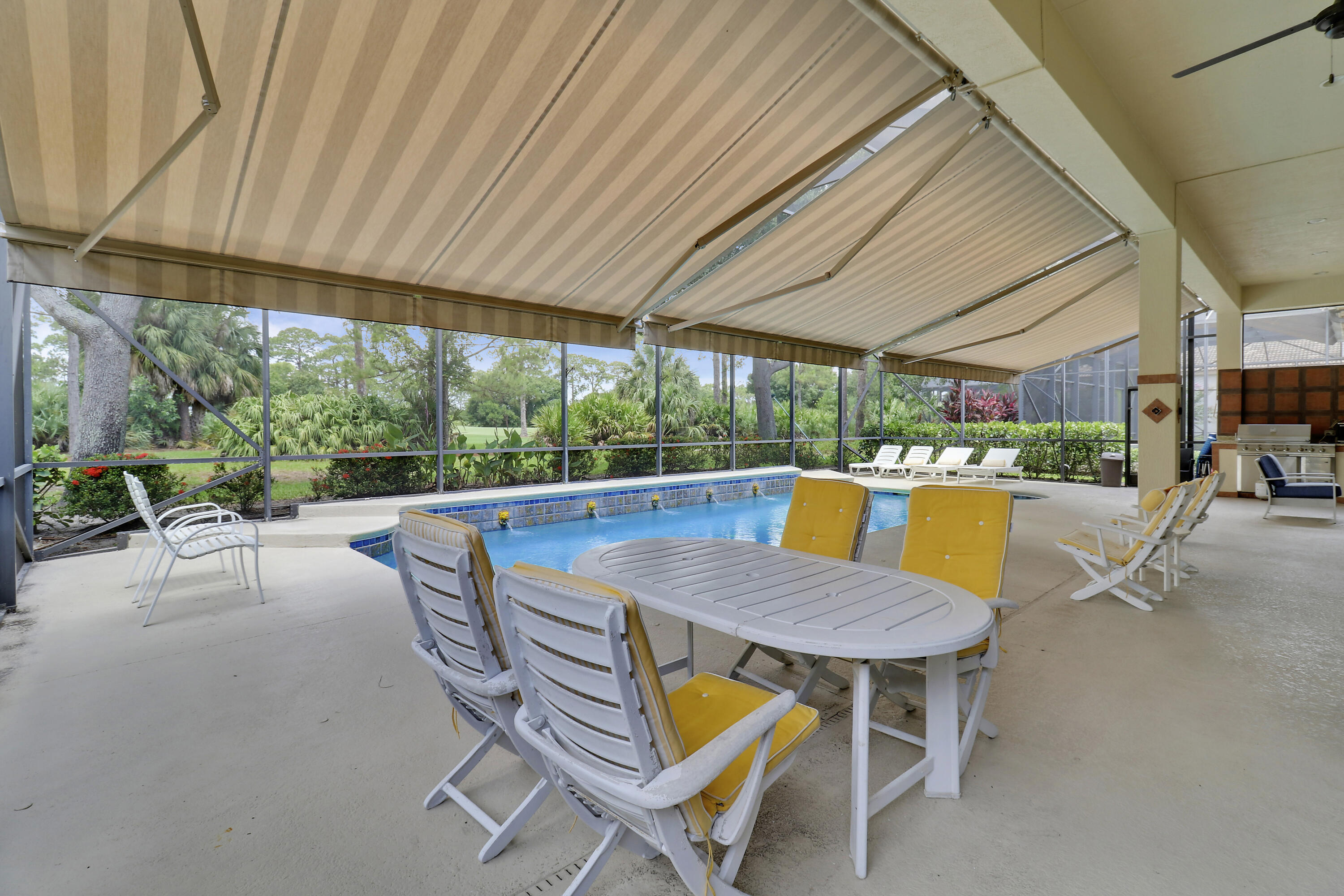 8613 Tompson Point Road Port St. Lucie, FL 34986 - Photo 51 of 78 Screened Patio w/Awning
