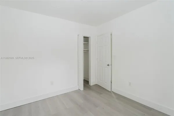 an empty room with a door