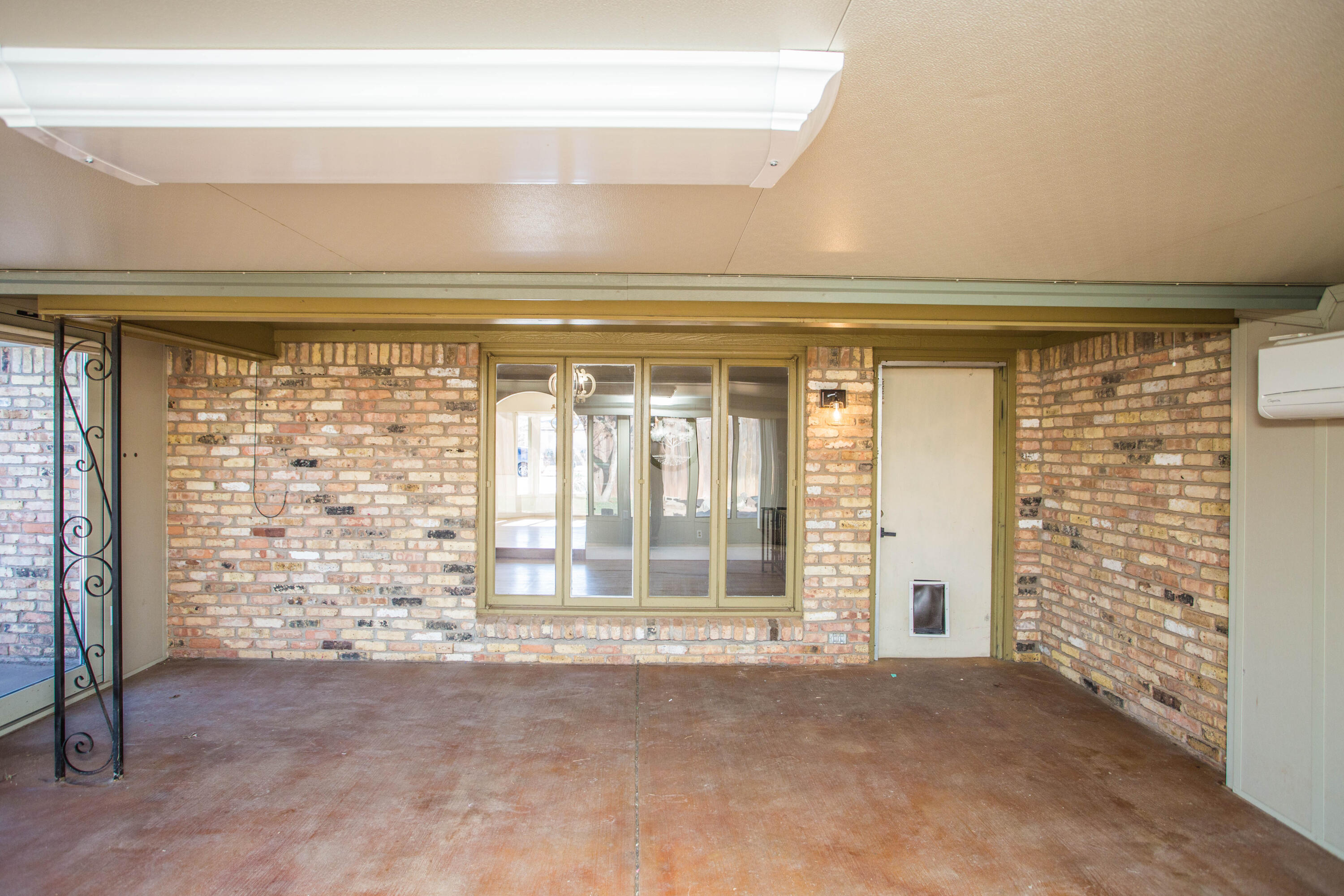 3710 75th Street Lubbock, TX 79423 - Photo 24 of 36 a view of empty room with windows