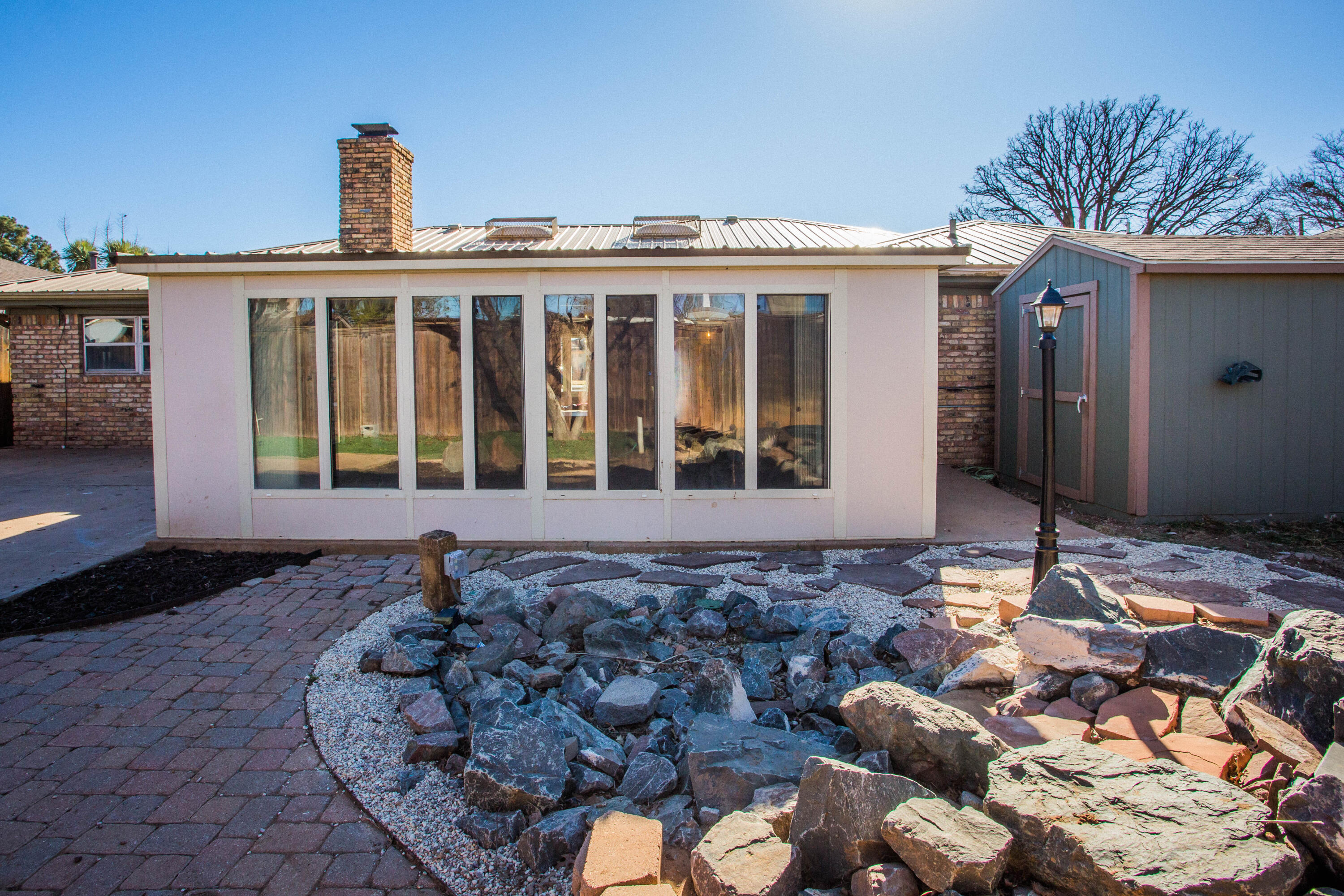 3710 75th Street Lubbock, TX 79423 - Photo 35 of 36 a front view of a house with a yard