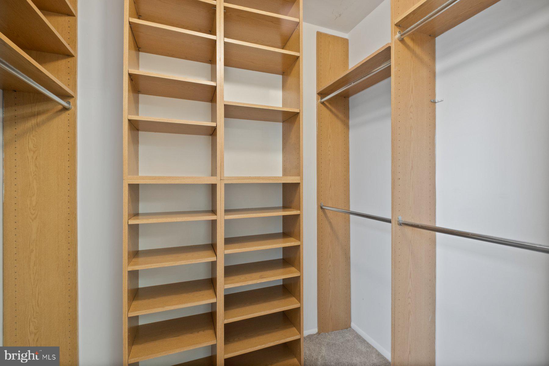 3030 Piano Lane, Unit 56 Silver Spring, MD 20904 - Photo 15 of 28 a view of walk in closet with empty racks