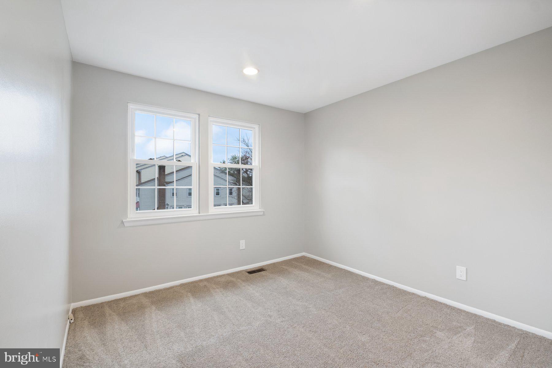 3030 Piano Lane, Unit 56 Silver Spring, MD 20904 - Photo 19 of 28 an empty room with windows