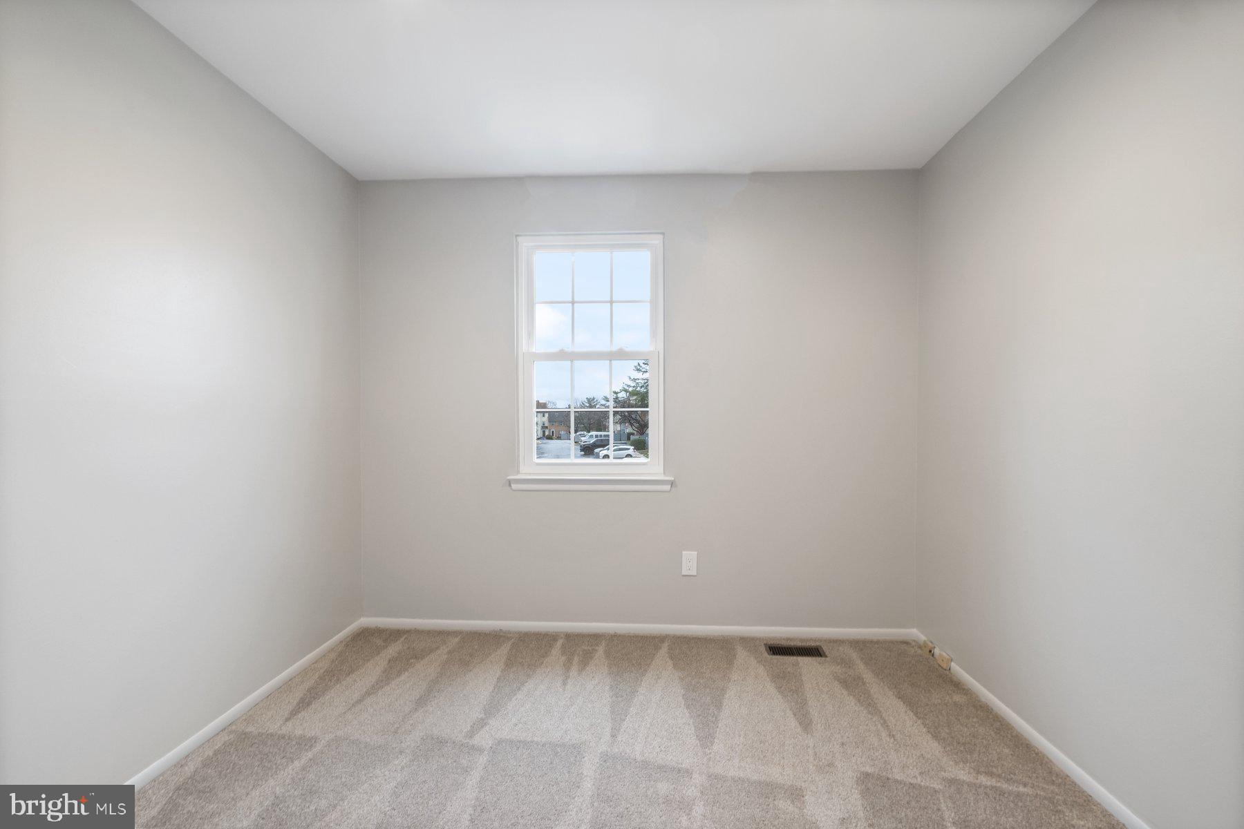 3030 Piano Lane, Unit 56 Silver Spring, MD 20904 - Photo 22 of 28 an empty room with a window