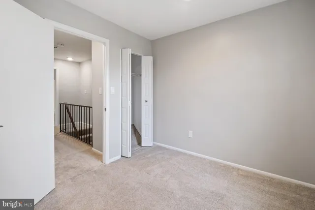 an empty room with a bathroom