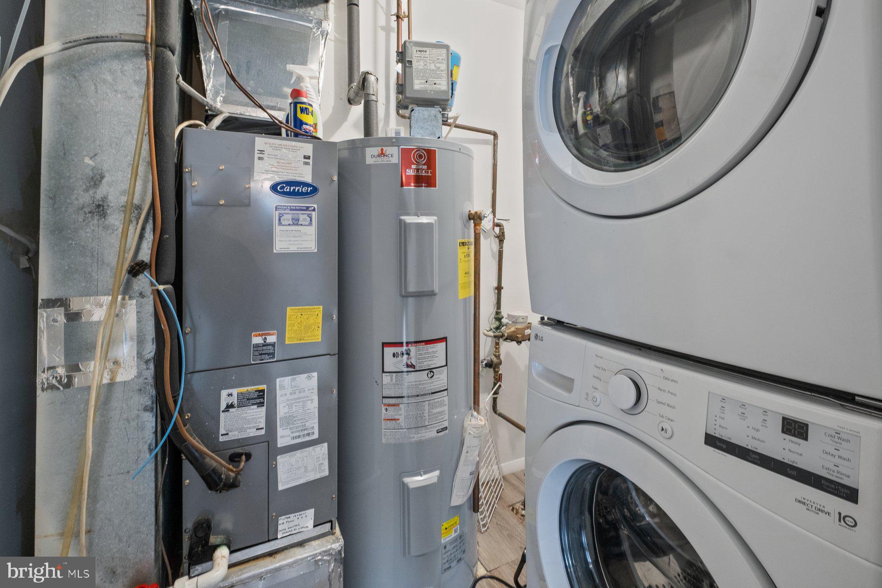 3030 Piano Lane, Unit 56 Silver Spring, MD 20904 - Photo 25 of 28 a utility room with dryer and washer