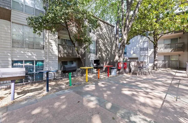 a view of parking garage with cars