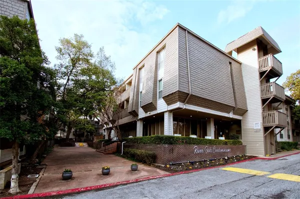 a view of a chairs and table on the wooden floor