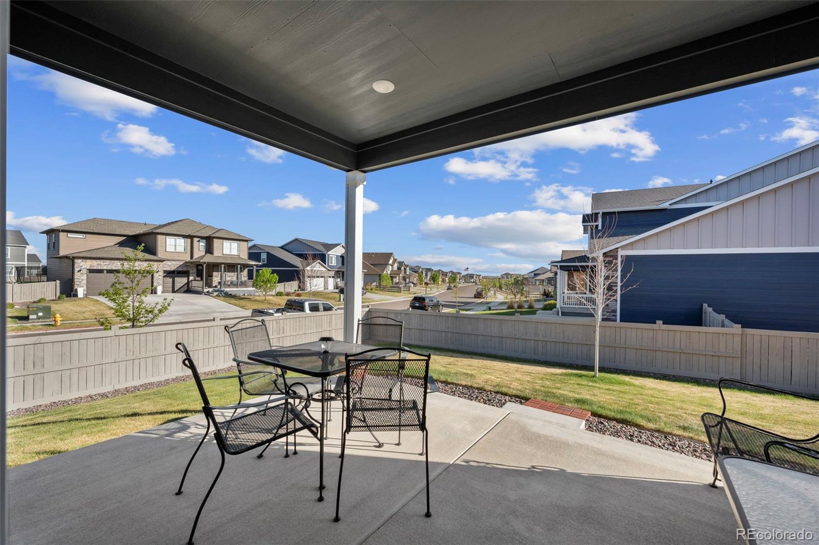 1680 Rivergate Way Berthoud, CO 80513 - Photo 21 of 41 a view of a swimming pool with a lounge chair