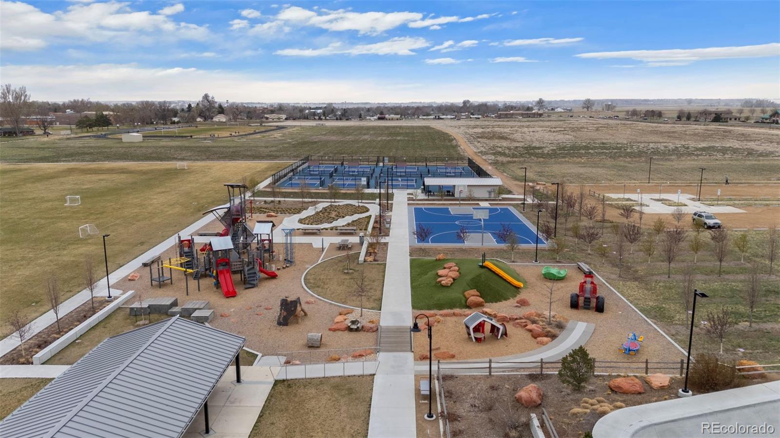 1680 Rivergate Way Berthoud, CO 80513 - Photo 29 of 41 a view of a city with lawn chairs
